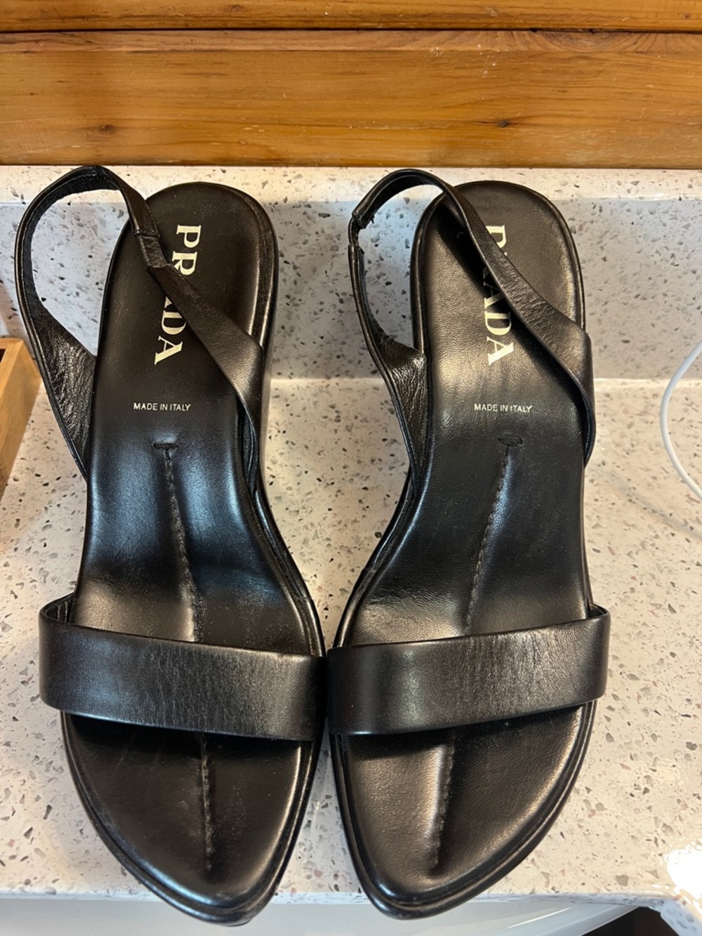 Prada Women’s Black Leather Slingback Wedges